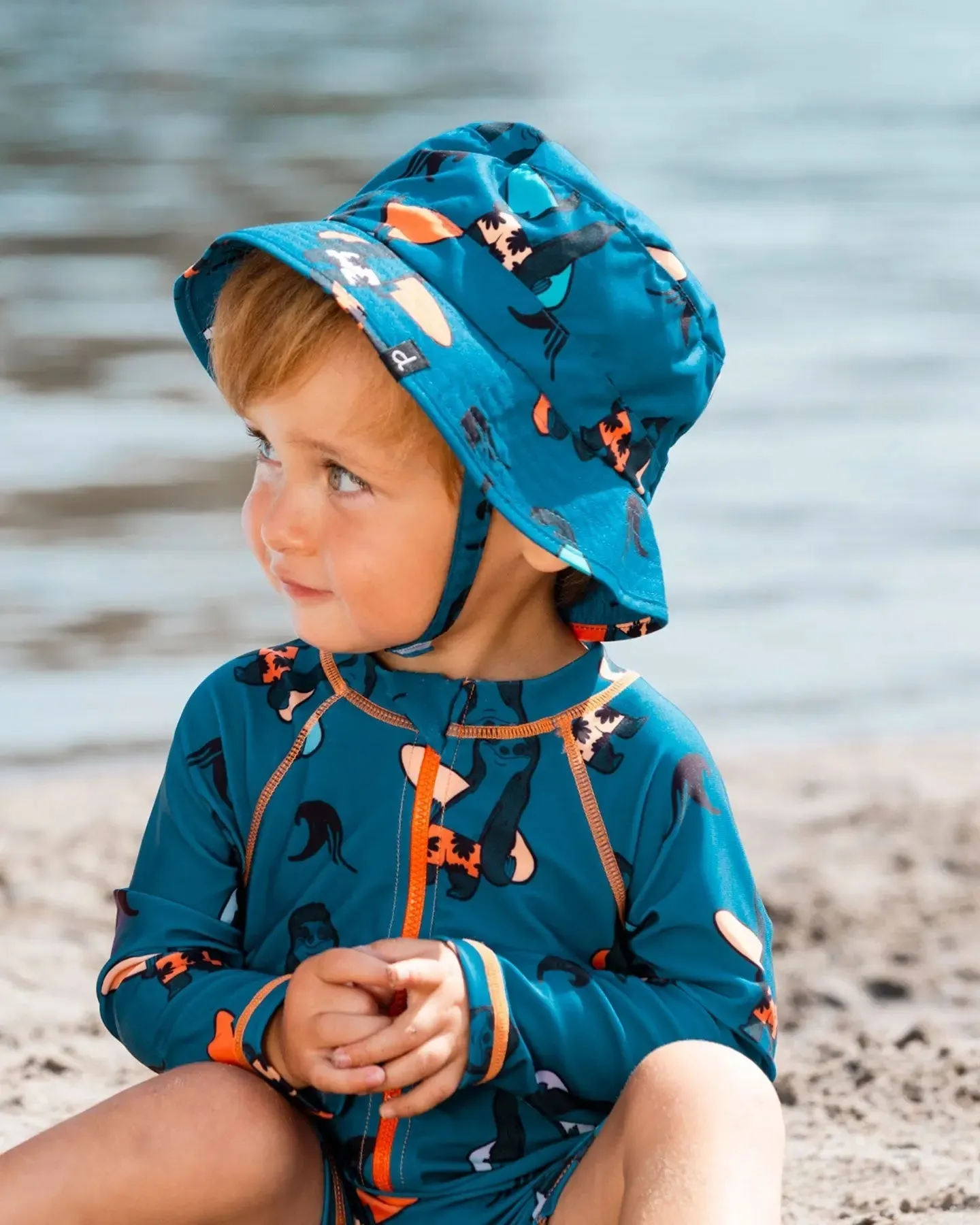 Printed Beach Hat Orange Sloths On Navy Blue